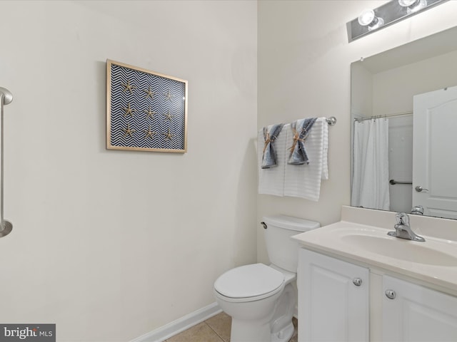 30413 Cedar Neck Rd Unit 304, Ocean View, DE 19970 - full bath featuring vanity, toilet, tile patterned flooring, baseboards, and curtained shower