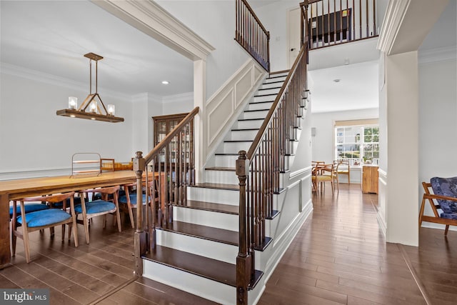 323 Palton Rd, Bensalem, PA 19020 - stairs with wood finished floors, ornamental molding, recessed lighting, and a chandelier