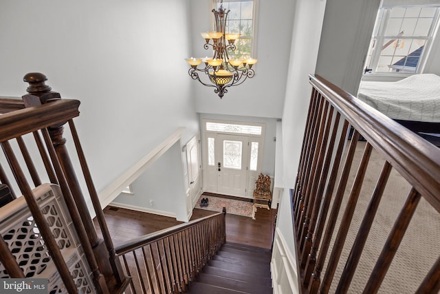 323 Palton Rd, Bensalem, PA 19020 - entrance foyer with dark wood-style floors, a chandelier, and a high ceiling