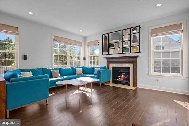 323 Palton Rd, Bensalem, PA 19020 - living area featuring dark wood finished floors, a fireplace with flush hearth, recessed lighting, and baseboards