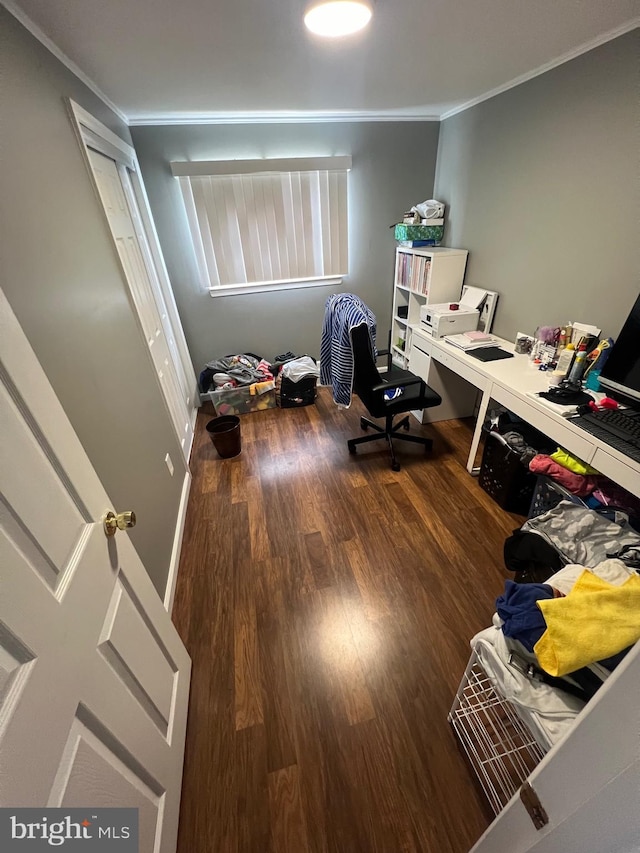 home office with ornamental molding and wood finished floors