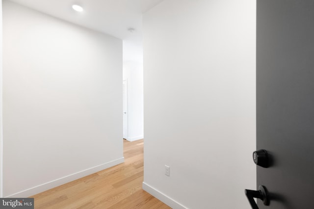 7175 12th St NW Unit 506, Washington, DC 20011 - hall featuring recessed lighting, baseboards, and light wood-type flooring