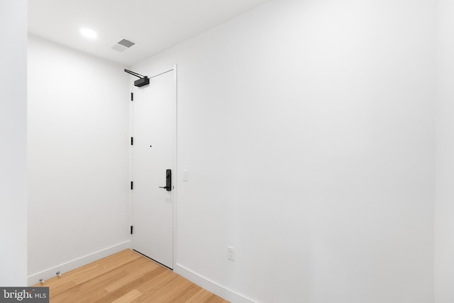 7175 12th St NW Unit 506, Washington, DC 20011 - interior space featuring baseboards, recessed lighting, light wood-style flooring, and visible vents