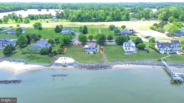 bird's eye view featuring a water view and a residential view