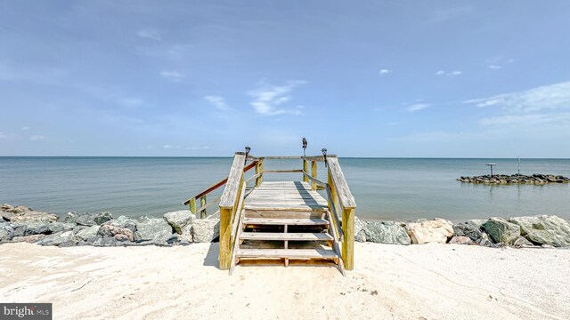 exterior space with a water view