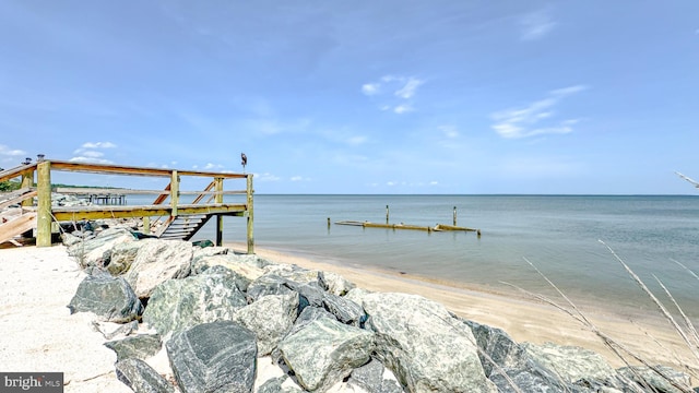 dock area featuring a water view