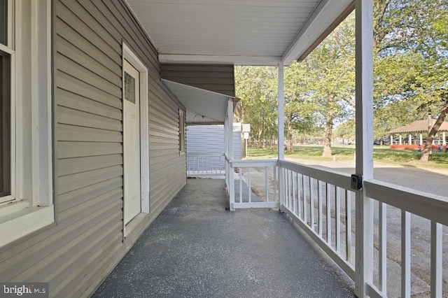 balcony featuring a porch