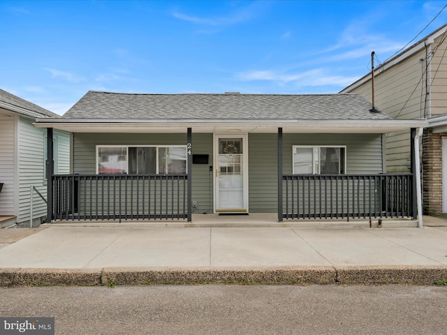 24 W Garibaldi Ave, Nesquehoning, PA 18240 - view of front of home with roof with shingles and covered porch