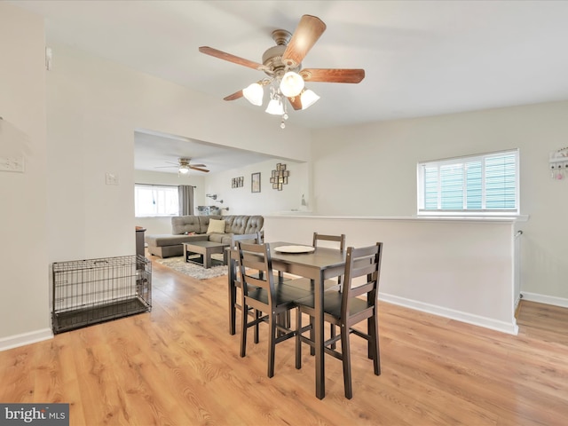 24 W Garibaldi Ave, Nesquehoning, PA 18240 - dining room featuring baseboards, ceiling fan, and wood finished floors