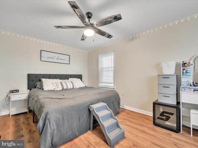 24 W Garibaldi Ave, Nesquehoning, PA 18240 - bedroom with baseboards, a ceiling fan, and wood finished floors