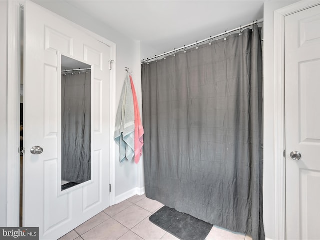 24 W Garibaldi Ave, Nesquehoning, PA 18240 - bathroom featuring a shower with shower curtain and tile patterned floors