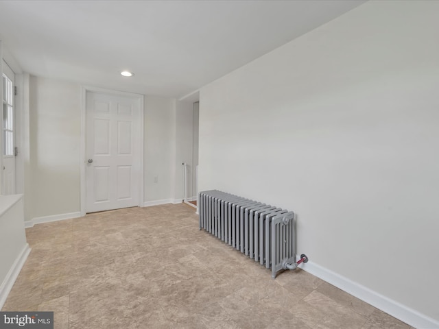 24 W Garibaldi Ave, Nesquehoning, PA 18240 - empty room featuring baseboards, recessed lighting, and radiator