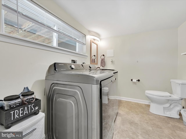 24 W Garibaldi Ave, Nesquehoning, PA 18240 - laundry room featuring washer and dryer, laundry area, and baseboards