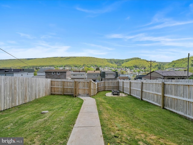 24 W Garibaldi Ave, Nesquehoning, PA 18240 - view of yard with a fenced backyard and an outdoor fire pit