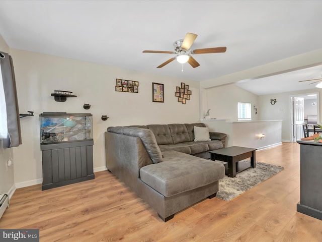 24 W Garibaldi Ave, Nesquehoning, PA 18240 - living area featuring baseboards, a ceiling fan, a baseboard radiator, and wood finished floors