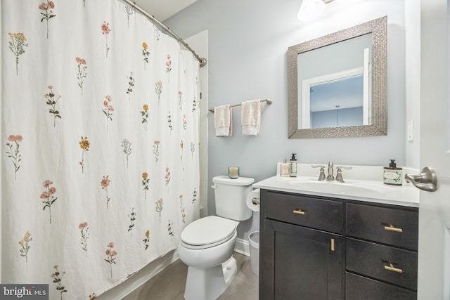 full bathroom featuring toilet, curtained shower, baseboards, tile patterned flooring, and vanity