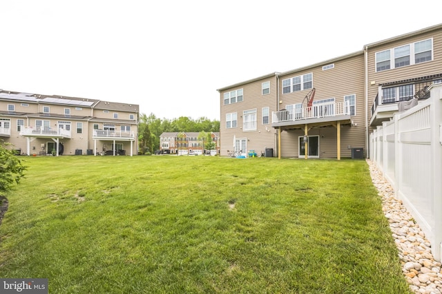 view of yard featuring central AC unit