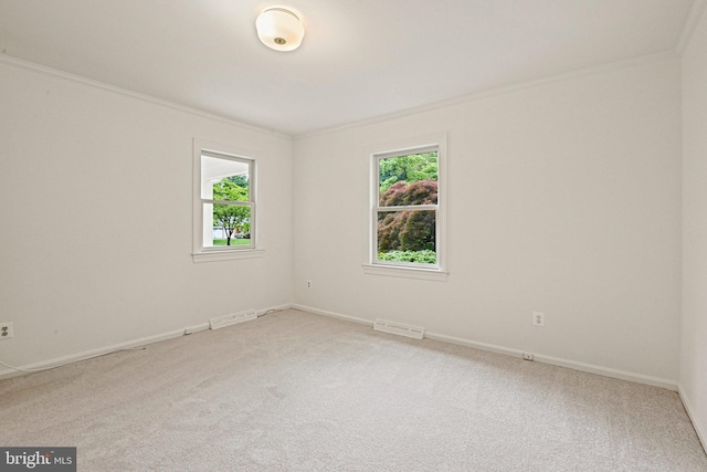 1716 Saddle Ridge Ct, Vienna, VA 22182 - unfurnished room featuring plenty of natural light, ornamental molding, light carpet, and baseboards