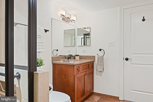 1716 Saddle Ridge Ct, Vienna, VA 22182 - full bathroom with vanity, tile patterned flooring, toilet, baseboards, and a shower