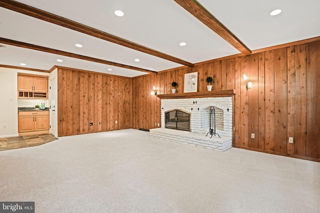 1716 Saddle Ridge Ct, Vienna, VA 22182 - unfurnished living room featuring beam ceiling, light colored carpet, recessed lighting, wooden walls, and a brick fireplace