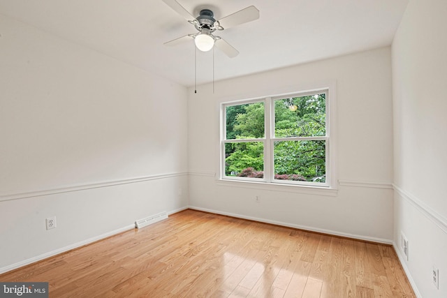 1716 Saddle Ridge Ct, Vienna, VA 22182 - spare room with light wood-style floors, ceiling fan, and baseboards