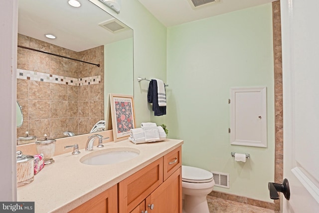 1716 Saddle Ridge Ct, Vienna, VA 22182 - full bathroom with tile patterned floors, toilet, vanity, and a shower