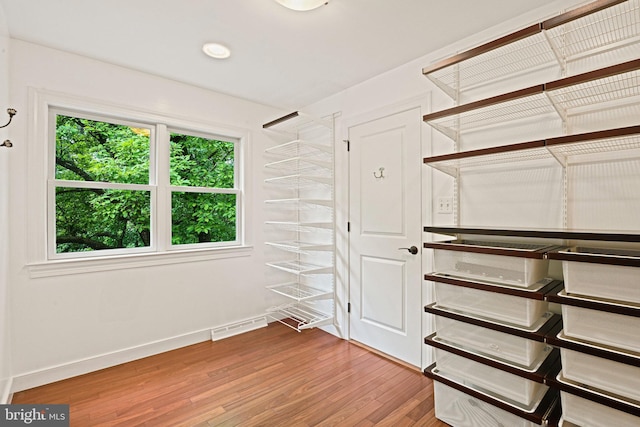 1716 Saddle Ridge Ct, Vienna, VA 22182 - spacious closet with wood finished floors