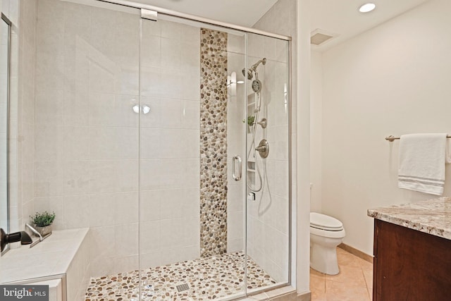 1716 Saddle Ridge Ct, Vienna, VA 22182 - bathroom with toilet, tile patterned flooring, a stall shower, vanity, and recessed lighting