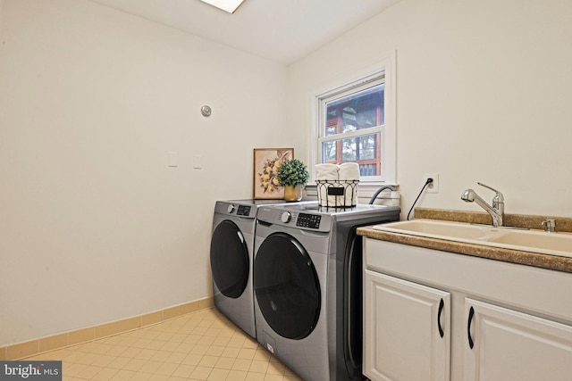 1716 Saddle Ridge Ct, Vienna, VA 22182 - laundry area with separate washer and dryer, cabinet space, baseboards, and light tile patterned floors