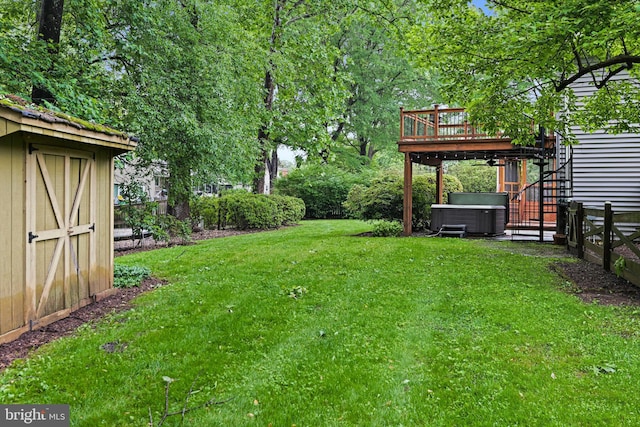 1716 Saddle Ridge Ct, Vienna, VA 22182 - view of yard with a hot tub, central air condition unit, a storage unit, an outdoor structure, and a wooden deck