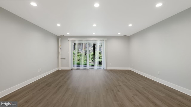 39 Oakmont Pl, Media, PA 19063 - unfurnished living room with recessed lighting, baseboards, and dark wood-style floors