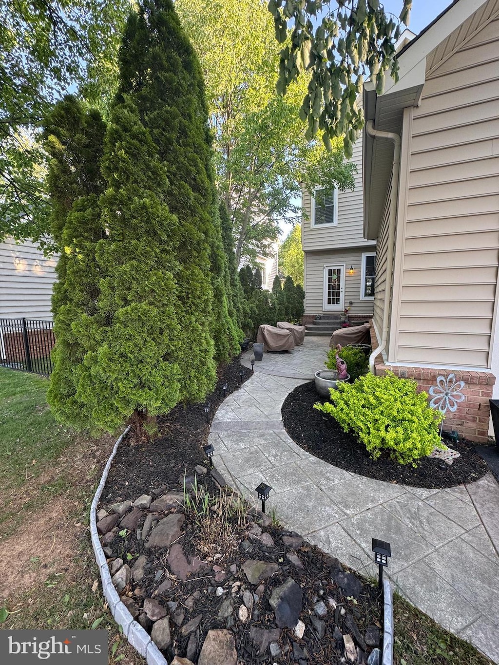 view of yard with a patio area and fence