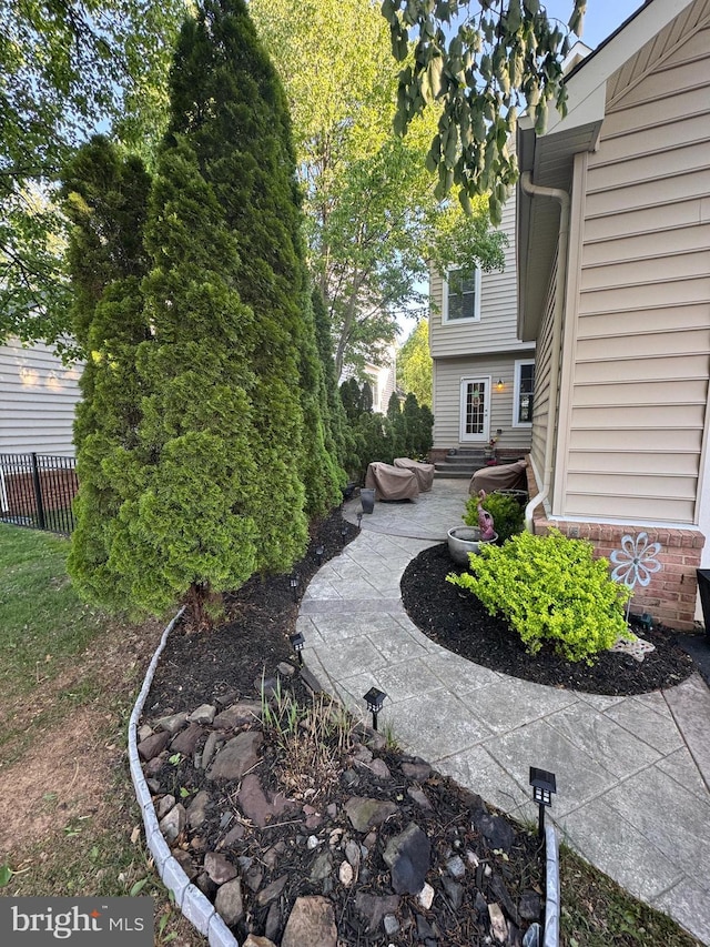 view of yard with a patio area and fence