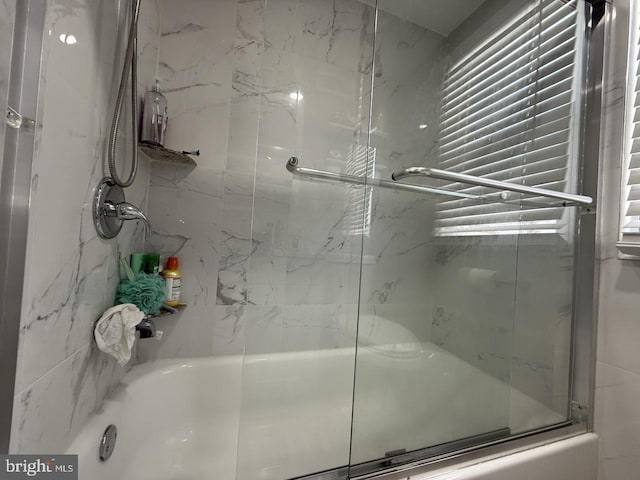 bathroom featuring enclosed tub / shower combo