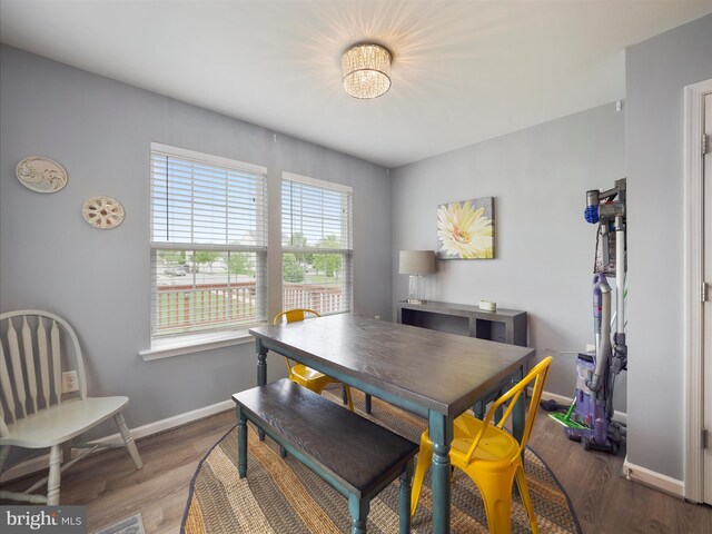 1161 Steed St, Ranson, WV 25438 - dining space with baseboards and wood finished floors