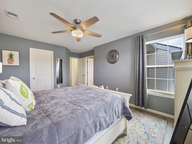 1161 Steed St, Ranson, WV 25438 - bedroom with baseboards, wood finished floors, and a ceiling fan