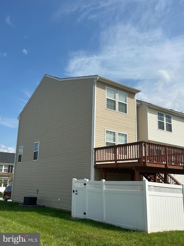 1161 Steed St, Ranson, WV 25438 - back of house featuring fence, central air condition unit, and a wooden deck