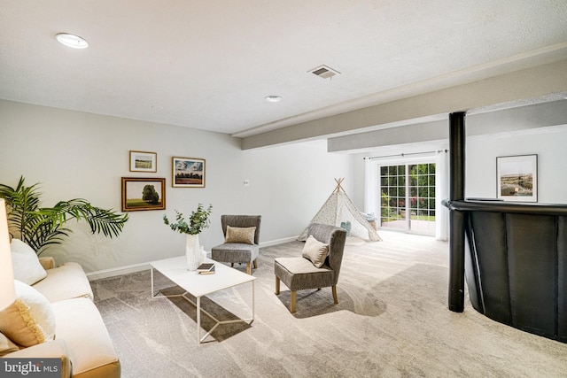 living room with carpet flooring, baseboards, and recessed lighting