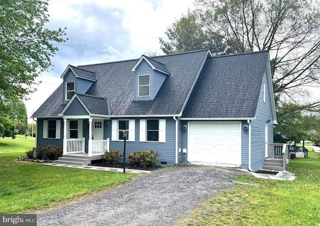 new england style home featuring a porch, a garage, a front yard, and a shingled roof