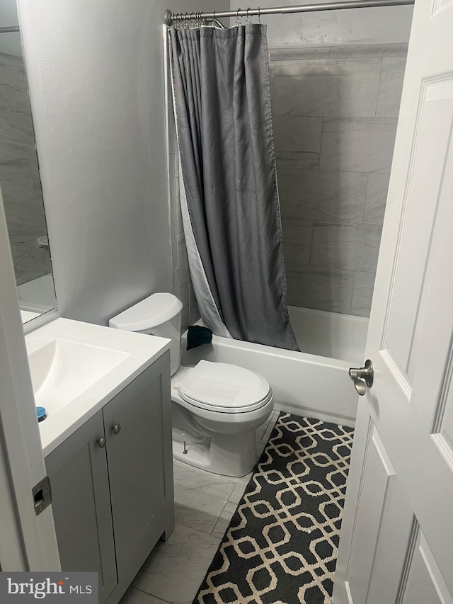 full bathroom with vanity, toilet, and shower / bath combo