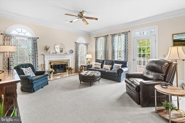 6341 Knollwood Dr, Frederick, MD 21701 - living room with carpet floors, plenty of natural light, crown molding, a ceiling fan, and a glass covered fireplace