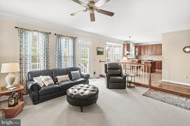 6341 Knollwood Dr, Frederick, MD 21701 - living room featuring ornamental molding, light colored carpet, ceiling fan, and baseboards