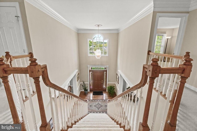 6341 Knollwood Dr, Frederick, MD 21701 - entryway with crown molding, a chandelier, and baseboards