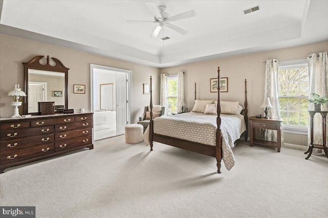 6341 Knollwood Dr, Frederick, MD 21701 - bedroom featuring a raised ceiling, light colored carpet, ensuite bathroom, and a ceiling fan