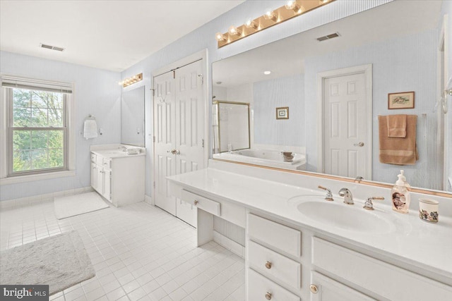 6341 Knollwood Dr, Frederick, MD 21701 - full bathroom featuring a shower stall, tile patterned floors, vanity, and a bath