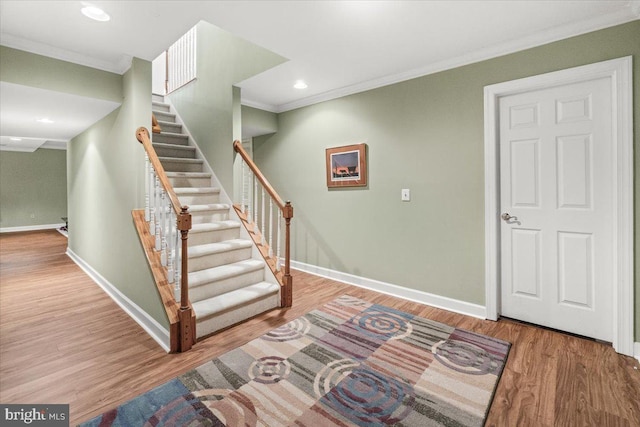 6341 Knollwood Dr, Frederick, MD 21701 - stairs with crown molding, wood finished floors, baseboards, and recessed lighting
