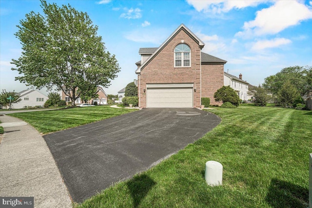 6341 Knollwood Dr, Frederick, MD 21701 - view of side of property with brick siding, driveway, a garage, and a yard