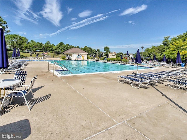 6341 Knollwood Dr, Frederick, MD 21701 - community pool featuring a patio
