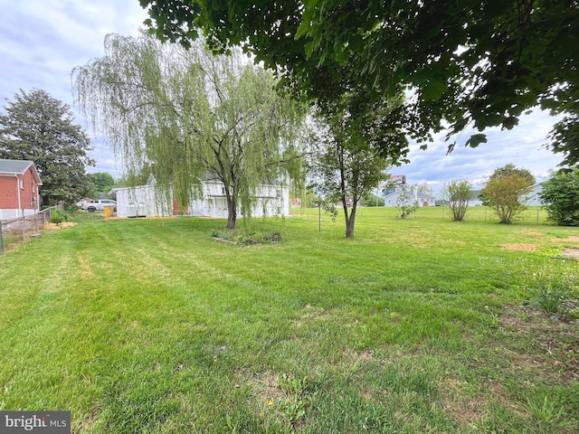view of yard with fence