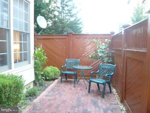 view of patio with fence